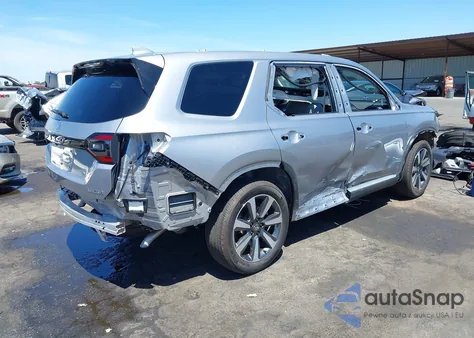 2025 Honda Pilot Touring z USA, uszkodzony, nr VIN 5FNYG2H78SB010372